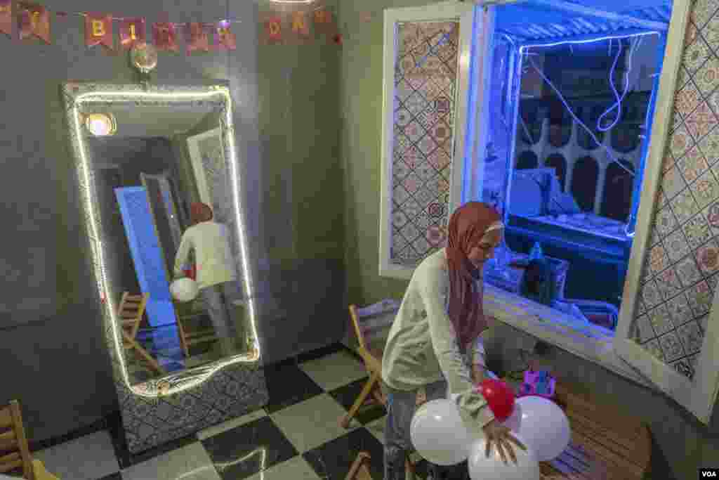 "My industry is dominated by men, and if you want to make it, you have to work for them," says Aya, a wedding and party planner, in Cairo, June 15, 2022. "Now, I'm working independently, taking it step by step, and I believe I'll make it on my own." 