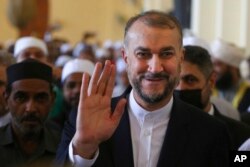 FILE - Iranian Foreign Minister Hossein Amir-Abdollahian waves during his visit to Hyderabad, India, June 10, 2022.