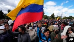 Protesters rally in support of recent protests and a national strike against the government of President Guillermo Lasso, near the National Assembly, in Quito, Ecuador, June 25, 2022. 