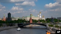 FILE - A view shows the Kremlin Palace and church cupolas towering over the Moskva River, in Moscow, Russia, June 2, 2022. 