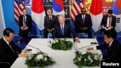 US President Joe Biden, US Secretary of State Antony Blinken, US Defense Secretary Lloyd Austin, South Korea's President Yoon Suk-yeol and Japanese Prime Minister Fumio Kishida meet during a NATO summit in Madrid, June 29, 2022. 