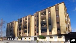 Libya's charred parliament building is seen in Tobruk, Libya, July 2, 2022. 