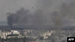 Северодонецк, 17 июня 2022 г. (Photo by ARIS MESSINIS / AFP)