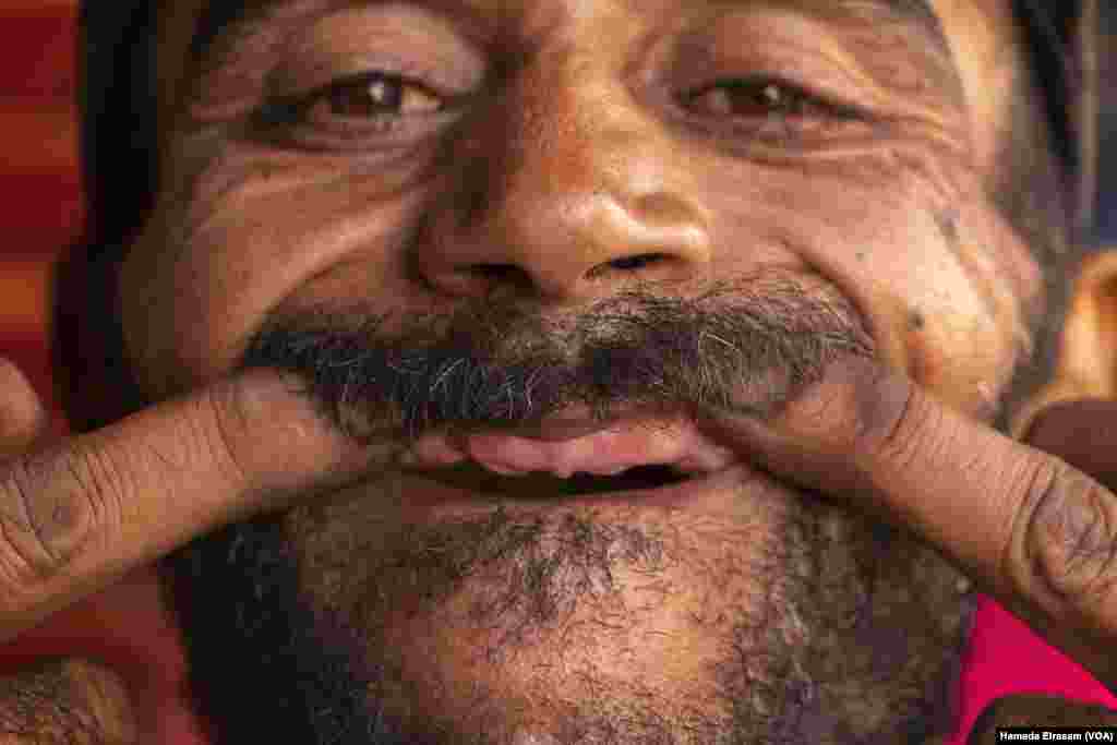 Mohamed Mostafa, a donkey-barber-turned-day-laborer and father of five, says, &#39;I can&rsquo;t afford or eat meat, so the charity of my community makes my children happy instead of feeling lesser than others.&#39; Old Cairo, July 5, 2022. (Hamada Elrasam/VOA)