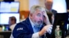 Wall Street Tumbles on Fears for Economy as More Rates Rise 