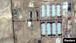 FILE - A satellite image from Maxar Technologies shows an overview of Soloda College in Semera, where thousands of ethnic Tigrayan civilians were held, according to witnesses, April 29, 2022.