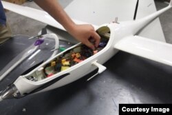 The Mars sailplanes will contain a series of custom-designed navigation sensors, as well as a camera and temperature and gas sensors to gather information about the Martian atmosphere and geological landscape. (Image Credit: Emily Dieckman/College of Engineering)