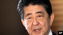 FILE - The late Shinzo Abe, Japan's former prime minister, is pictured Sept. 16, 2020.