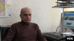 Shahin Hacıyev, executive director of the Najaf Najafov Foundation, a media development fund, is pictured at his office, Feb. 22, 2022.
