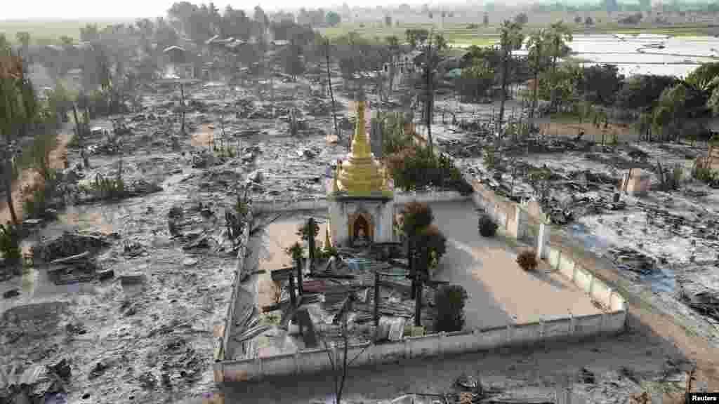 An aerial view of Bin village of the Mingin Township in Sagaing region, Myanmar, after villagers say it was set ablaze by the military, Feb. 3, 2022. 