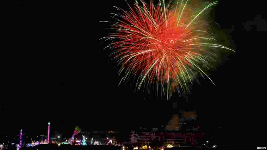 Independence Day fireworks explode over the San Diego County Fair, in Del Mar, California, July 4, 2022.