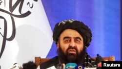 FILE - Taliban Foreign Minister Amir Khan Muttaqi speaks during a news conference in Kabul, Afghanistan on Sept. 14, 2021.