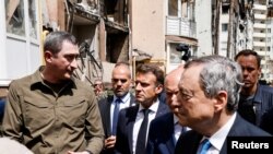 Emanuel Makron, Olaf Šolc i Mario Dragi u Irpinu