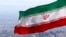 FILE - Iran's national flag waves in Tehran, Iran, March 31, 2020.