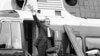 FILE - In this Aug. 9, 1974 file photo, President Richard Nixon waves goodbye from the steps of his helicopter outside the White House, after he gave a farewell address to members of the White House staff.