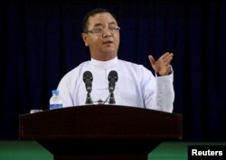 FILE - Myanmar's military junta spokesman Zaw Min Tun speaks during the information ministry's press conference in Naypyitaw, Myanmar, March 23, 2021.