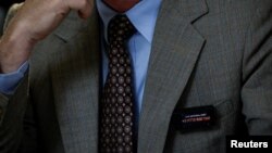 Republican U.S. Representative Thomas Massie of Kentucky wears a pin displaying the amount of the U.S. national debt during a House Committee on Rules hearing about whether to raise the U.S. debt ceiling and avoid default at the U.S. Capitol in Washington, May 30, 2023. 