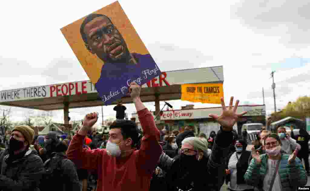 People react after the verdict in the trial of former Minneapolis police officer Derek Chauvin, found guilty of the death of George Floyd, at George Floyd Square in Minneapolis, Minnesota.