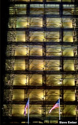 Surrounded by metal scaffolding and plastic sheets, the Washington Monument became a magical sight at night. (Photo: Steve Ember)