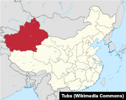 A map of China shows Xinjiang Uyghur Autonomous Region in red.