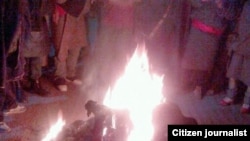 The 23-year-old Tibetan man, Tsepak Kyap, is seen here engulfed in flames near a bus stop in the township of Sankok, Sangchu county, in China’s northwestern Gansu province. This photo was sent into to the VOA Tibetan Service.