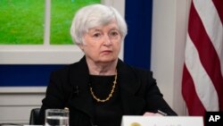 FILE - Treasury Secretary Janet Yellen listens during a meeting with business leaders about the debt limit in the South Court Auditorium on the White House campus, Oct. 6, 2021, in Washington.