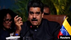 Venezuela's President Nicolas Maduro speaks at the IV Gas Exporting Countries Forum in Santa Cruz, Bolivia, Nov. 24, 2017.