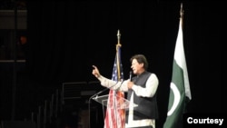 Pakistani Prime Minister Imran Khan addresses Pakistani Americans at Capital One Arena in Washington, July 21, 2019. 