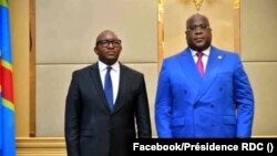 Jean-Michel Sama Lukonde, le nouveau Premier ministre (G) et le président Félix Tshisekedi, au Palaise de la nation, Kinshasa, 18 mars 2021. (Facebook/Présidence RDC)