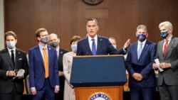 U.S. Senator Mitt Romney (R-UT) speaks as bipartisan members of the Senate and House gather to announce a framework for fresh COVID-19 relief legislation at a news conference on Capitol Hill in Washington, Dec. 1, 2020.