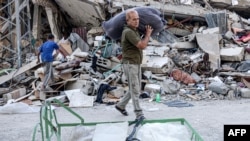 ساختمانی در شهر رفح واقع در جنوب غزه که هدف حمله قرار گرفته است. 
