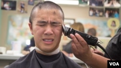 A new cadet receives a haircut during the U.S. Military Academy at West Point’s Reception Day, June 27, 2016. (Staff Sgt. Vito T. Bryant/U.S. Army)