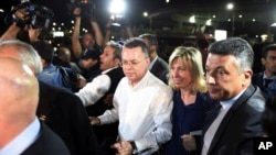 Pastor Andrew Brunson, center left, and his wife Norine Brunson arrive at Adnan Menderes airport for a flight to Germany after his release following his trial in Izmir, Turkey, Oct. 12, 2018.