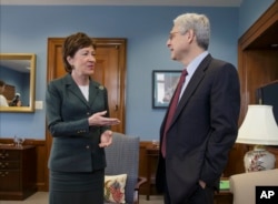 Judge Merrick Garland, right, President Barack Obama’s choice to replace the late Justice Antonin Scalia on the Supreme Court, meets with Sen. Susan Collins, R-Maine, on Capitol Hill in Washington, April 5, 2016.