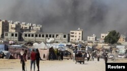 ፎቶ ፋይል፡ በእስራኤል እና በሃማስ መካከል በቀጠለው ግጭት በካን ዮኒስ የቃጠሎ ጭስ ይታያል፤ እአአ ነሃሴ 16/2024