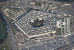 FILE - Pentagon is seen from an airplane over Washington, DC.