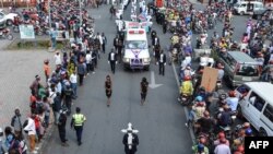 Des militants de la Lucha lors de la procession funéraire de l'activiste congolais pro-démocratie, Luc Nkulula, à Goma, le 14 juin 2018.