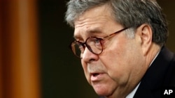 Attorney General William Barr speaks about the release of a redacted version of special counsel Robert Mueller's report during a news conference, April 18, 2019, at the Department of Justice in Washington. 