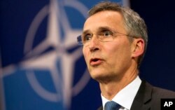 FILE - NATO Secretary General Jens Stoltenberg addresses the media at NATO headquarters in Brussels, Nov. 24, 2015.