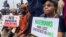 FILE - Supporters of the People's Democratic Party protest election results at the national headquarters of the Independent National Electoral Commission in Abuja, Nigeria, on March 6, 2023.