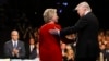 Democratic presidential nominee Hillary Clinton and Republican presidential nominee Donald Trump shake hands during the presidential debate at Hofstra University in Hempstead, N.Y. 