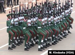 Members of a Nigerian troop guest contingent march in National Day celebrations in Yaounde, Cameroon, May 20, 2018.