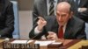 FILE - U.S. Special Representative for Venezuela Elliott Abrams points towards Russia's United Nations Ambassador during a tense exchange at a meeting on Venezuela in the U.N. Security Council at U.N. headquarters, Feb. 26, 2019. 