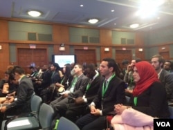 FILE - Young people from around the world attend the "World Bank Group Youth Summit 2015: Crowdsourcing Solutions for Climate Change," in Washington, Nov. 17, 2015. (M. Diallo/VOA)
