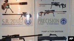 Assorted military guns are on display at India's defense show in New Delhi, 15 Feb 2010