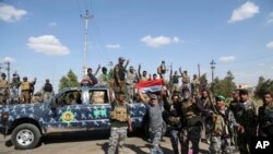 យោធា​អ៊ីរ៉ាក់​ត្រៀម​វាយ​ប្រហារ​ទីតាំង​របស់​រដ្ឋ​អ៊ីស្លាម​នៅ​ក្នុង​ក្រុង​ Tikrit ដែល​មាន​ចម្ងាយ​១៣០គ.ម​នៅ​ភាគ​ខាង​ជើង​នៃ​ក្រុង​បាកដាដ​ ប្រទេស​អ៊ីរ៉ាក់ កាលពី​ថ្ងៃទី២៦ ខែមីនា ឆ្នាំ២០១៥។