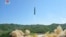 This image made from video of a news bulletin aired by North Korea's KRT on Tuesday, July 4, 2017, shows what was said to be the launch of a Hwasong-14 intercontinental ballistic missile, ICBM, in North Korea's northwest. 