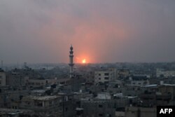 This picture taken from Rafah in the southern Gaza Strip on Dec. 5, 2023, shows an explosion in Khan Yunis as battles between Israel and Hamas militants continue.