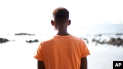 FILE - Alhaji, who is gay and whose last name has been withheld for his safety, poses for a picture at La Pointe des Almadies, in Dakar, Senegal.