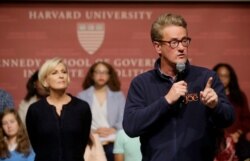 FILE - MSNBC television anchors Joe Scarborough, right, and Mika Brzezinski, co-hosts of the show "Morning Joe," take questions at a discussion forum on the campus of Harvard University, in Cambridge, Massachusetts, Oct. 11, 2017.